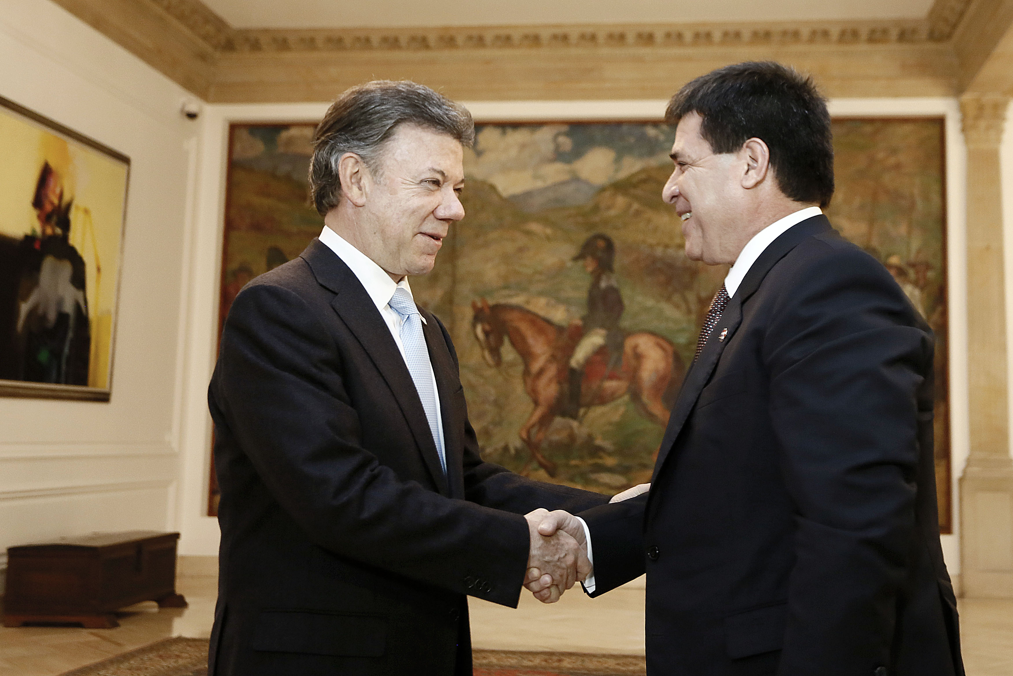CARTES Y JUAN MANUEL SANTOS